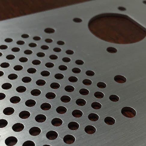 sheet metal part with holes
