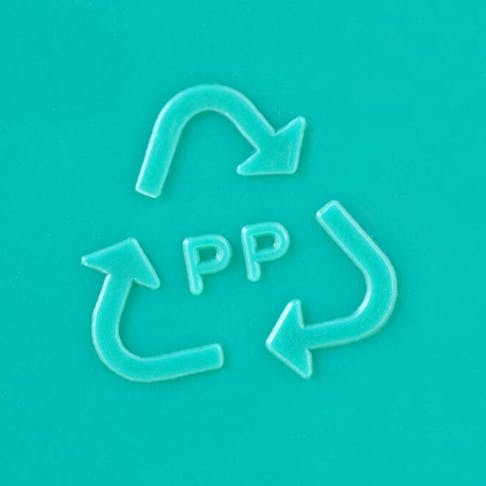 Close-up of plastic recycling symbol. Image Credit: CalypsoArt/Shutterstock.com