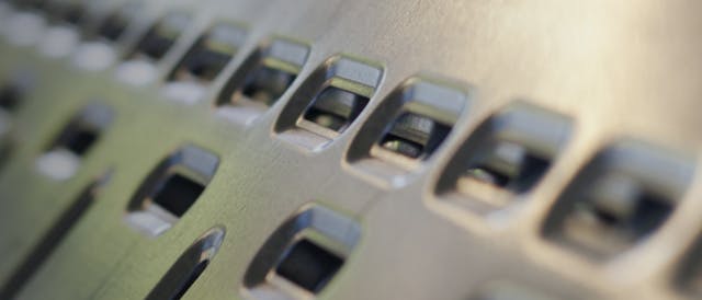 A metal stamped parts with multiple slots