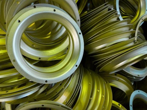 Metal stamped parts with sulfur-oxidated anodize finish. Image Credit: Shutterstock.com/teh_z1b