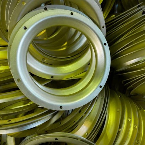 Anodized aluminium parts produced by metal stamping process. Image Credit: teh_z1b/Shutterstock.com