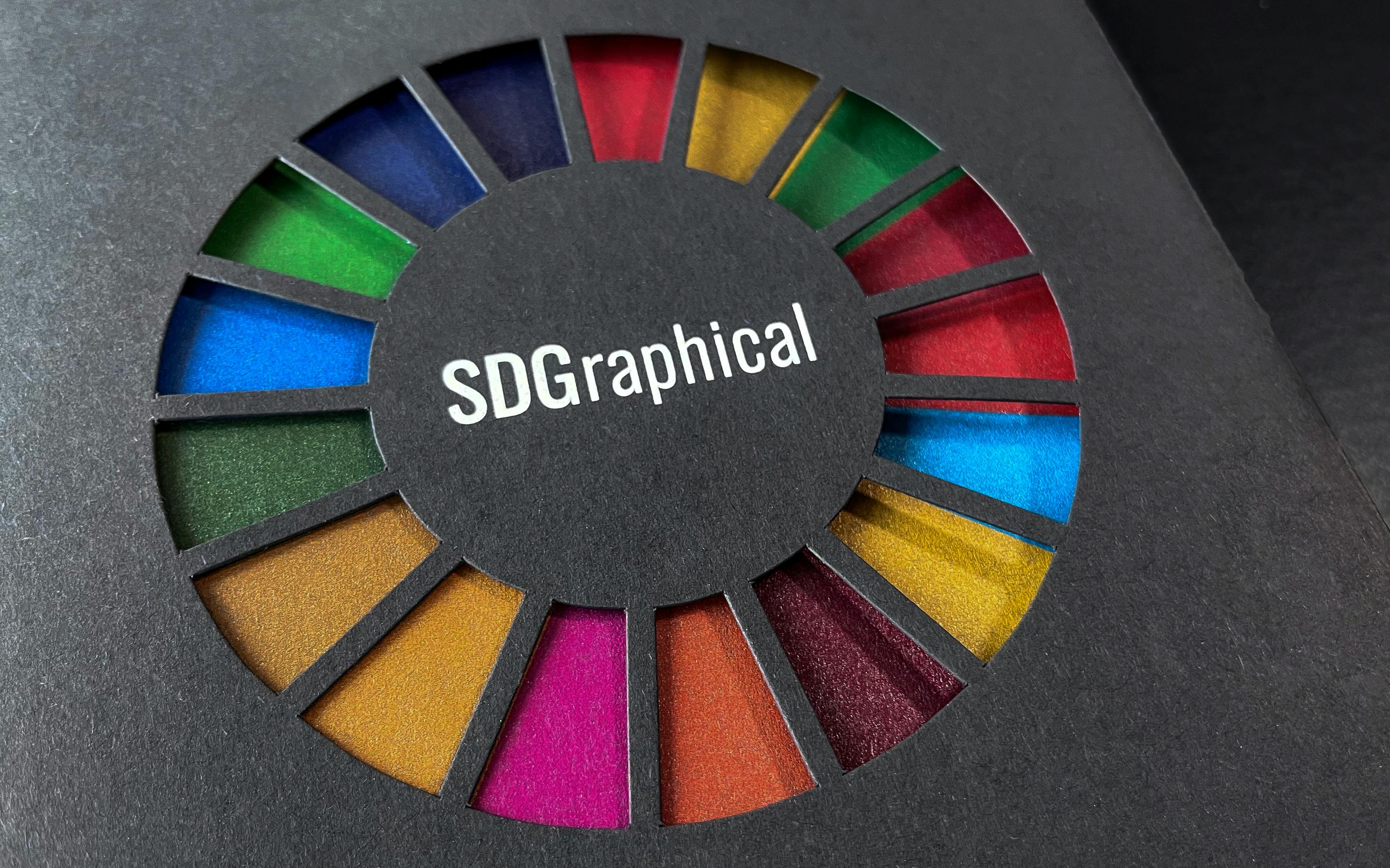 The 2030 Agenda is one of the largest projects of the United Nations, as it seeks to significantly improve and measure a wide range of global issues from the environment to inequality. SDGraphics makes an important contribution to the question of how to communicate the progress of this agenda. With its appealing aesthetics and high-quality, sustainable production, it encourages engagement with the data it presents and appeals to statisticians and the general public.