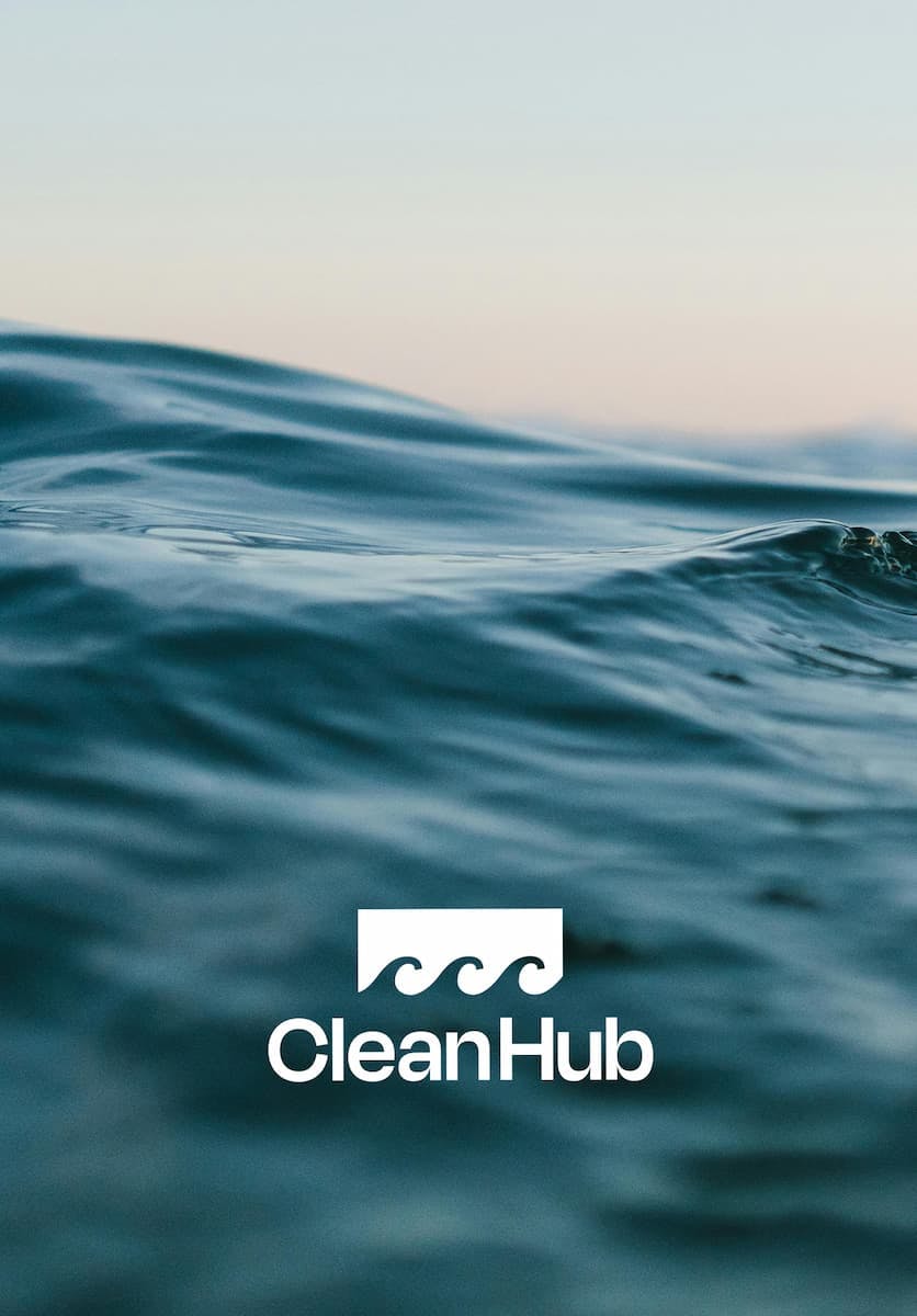 CleanHub logo, with a background of a plastic-free ocean