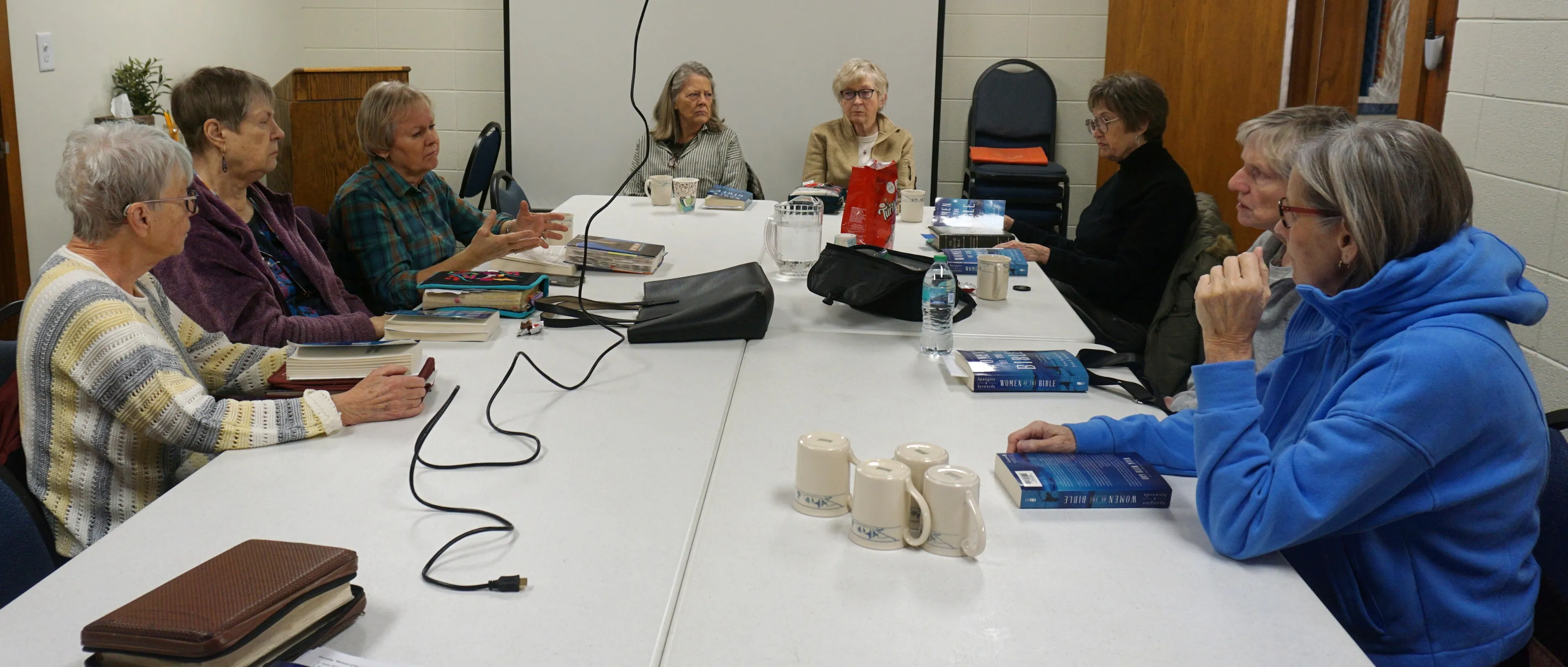 Group of women dive in with books and videos