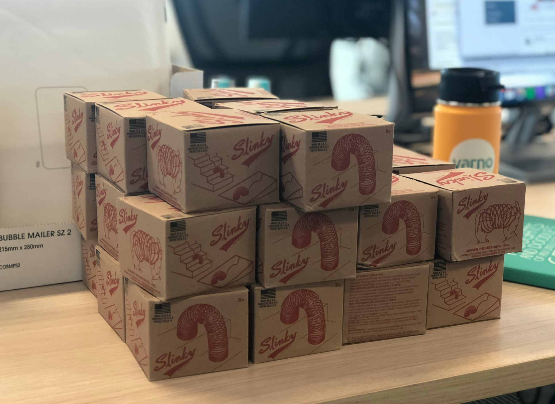 Boxes of slinkies, stacked