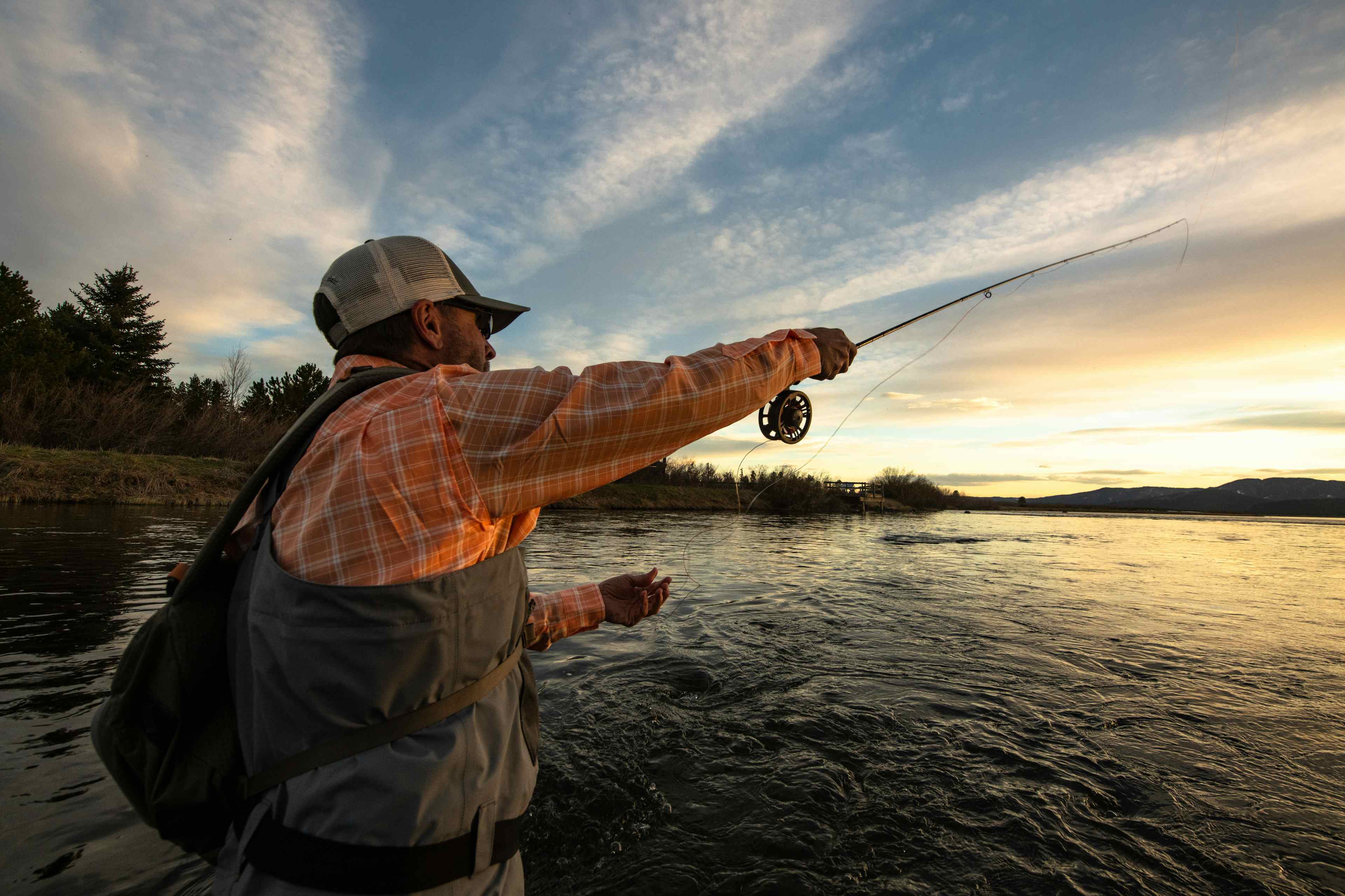 Fly fisherman on the Henry's Fork in Island Park, Idaho.