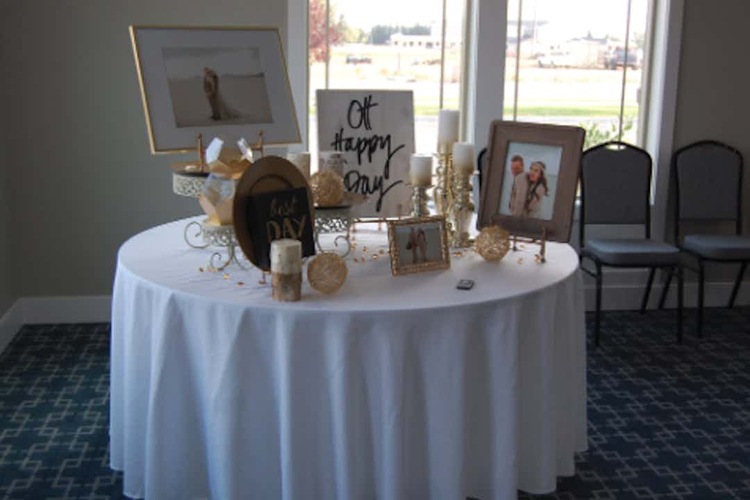 A table adorned with wedding decorations.