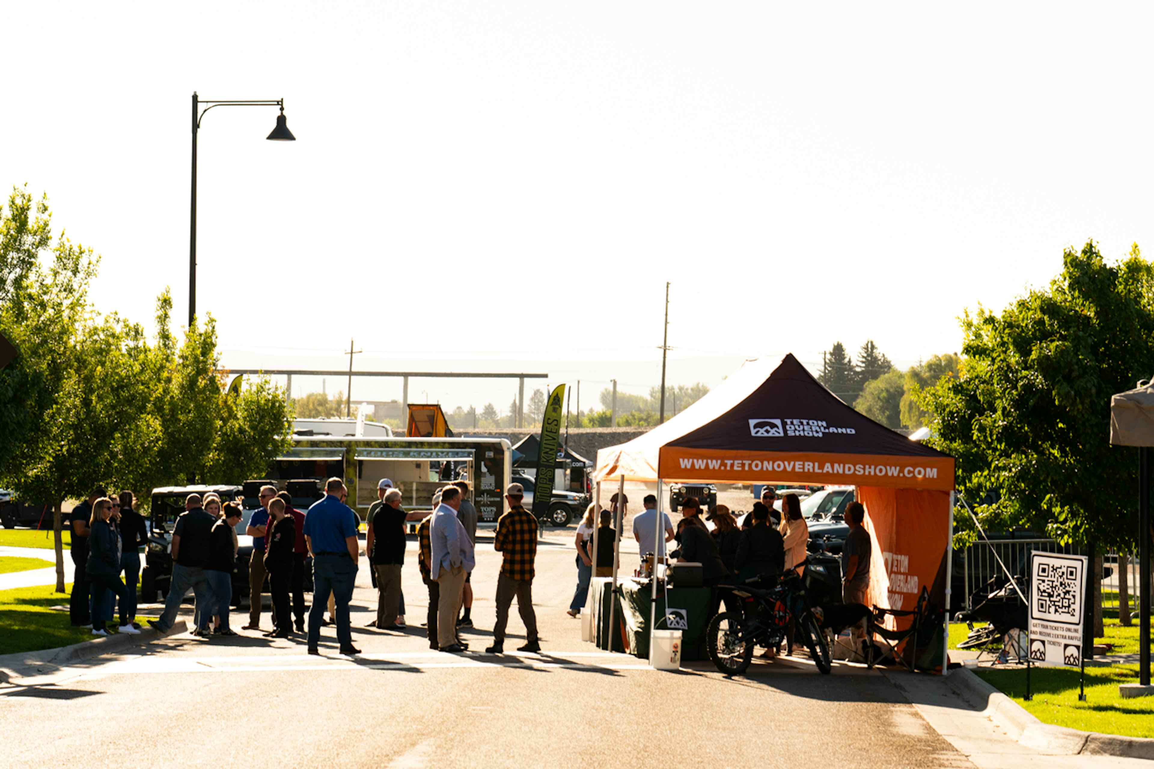 Attendees stand in line to attend the Teton Overland Show in Idaho Falls.