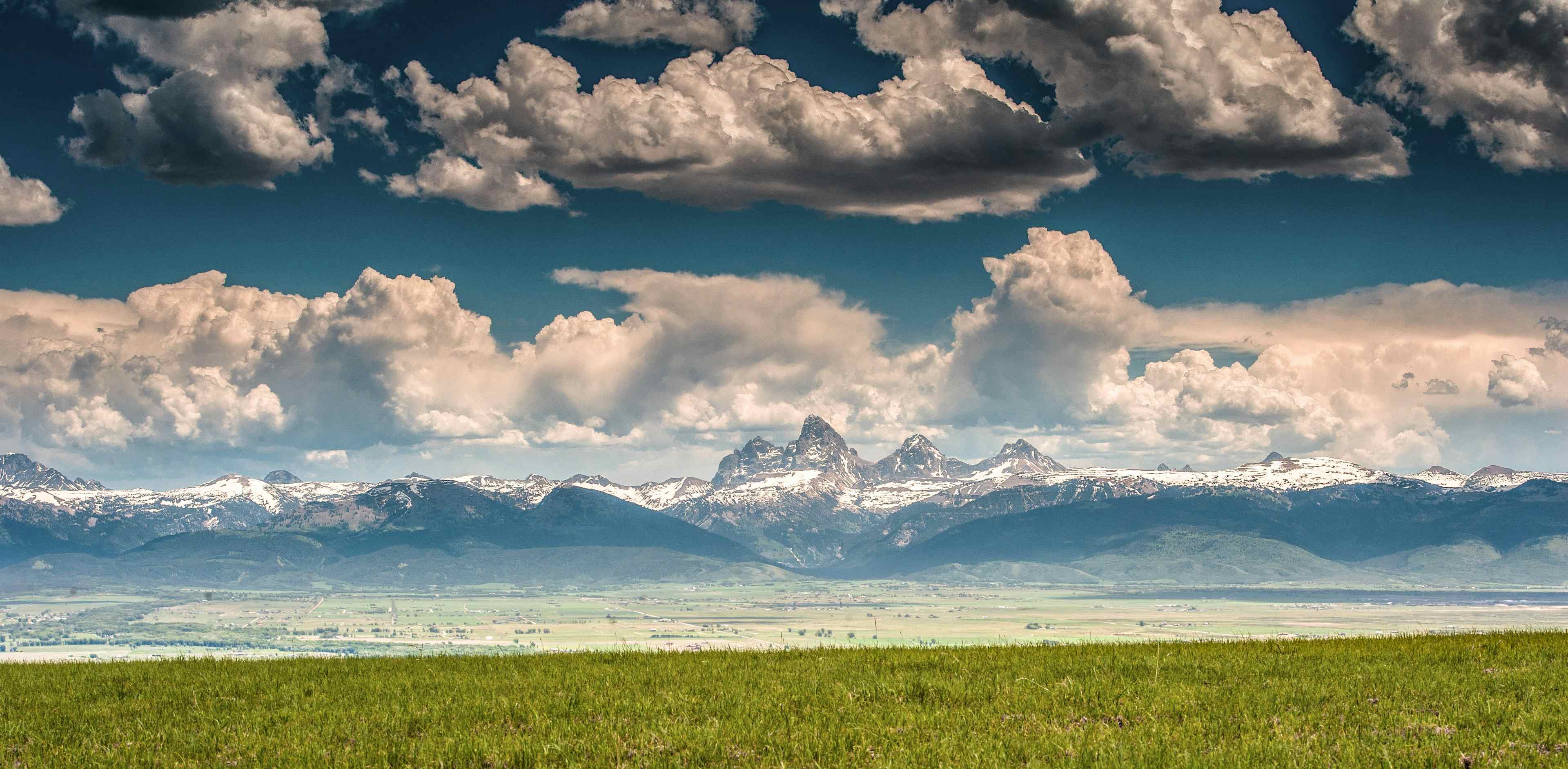 The Teton Mountain Range overlooking Teton Valley in Eastern Idaho, a part of the Yellowstone Teton Territory.