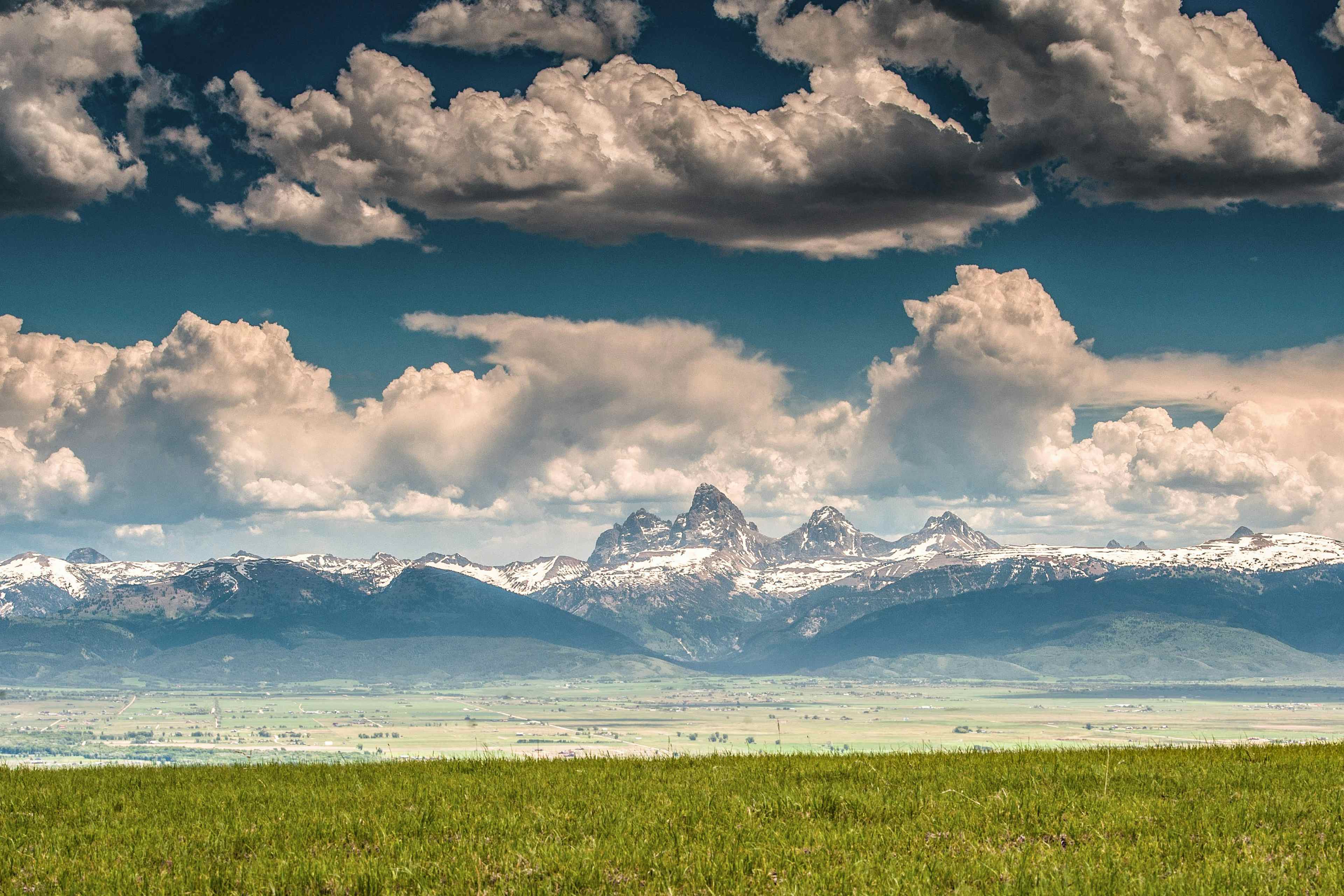 The Teton Mountain Range overlooking Teton Valley in Eastern Idaho, a part of the Yellowstone Teton Territory.