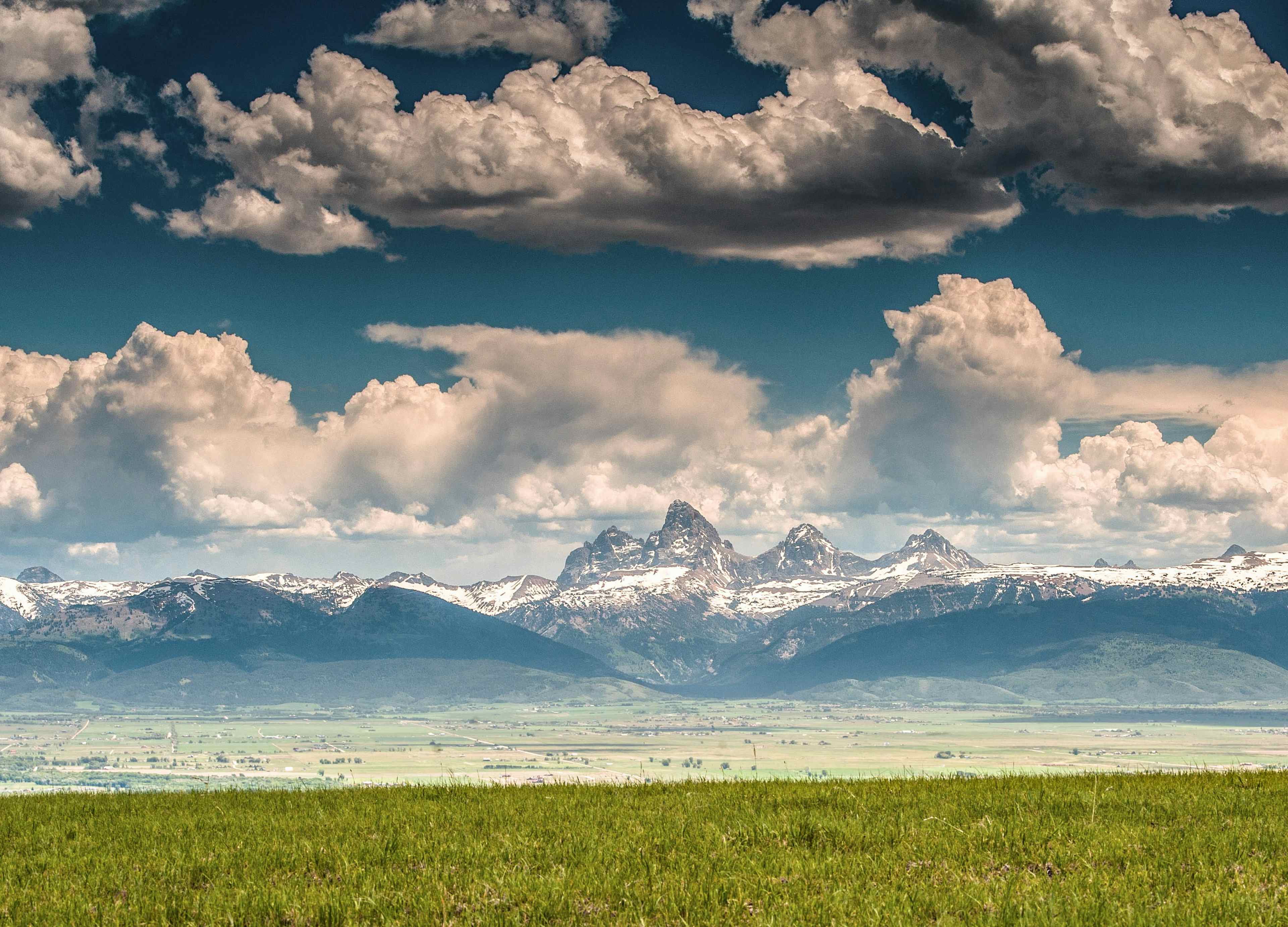 The Teton Mountain Range overlooking Teton Valley in Eastern Idaho, a part of the Yellowstone Teton Territory.