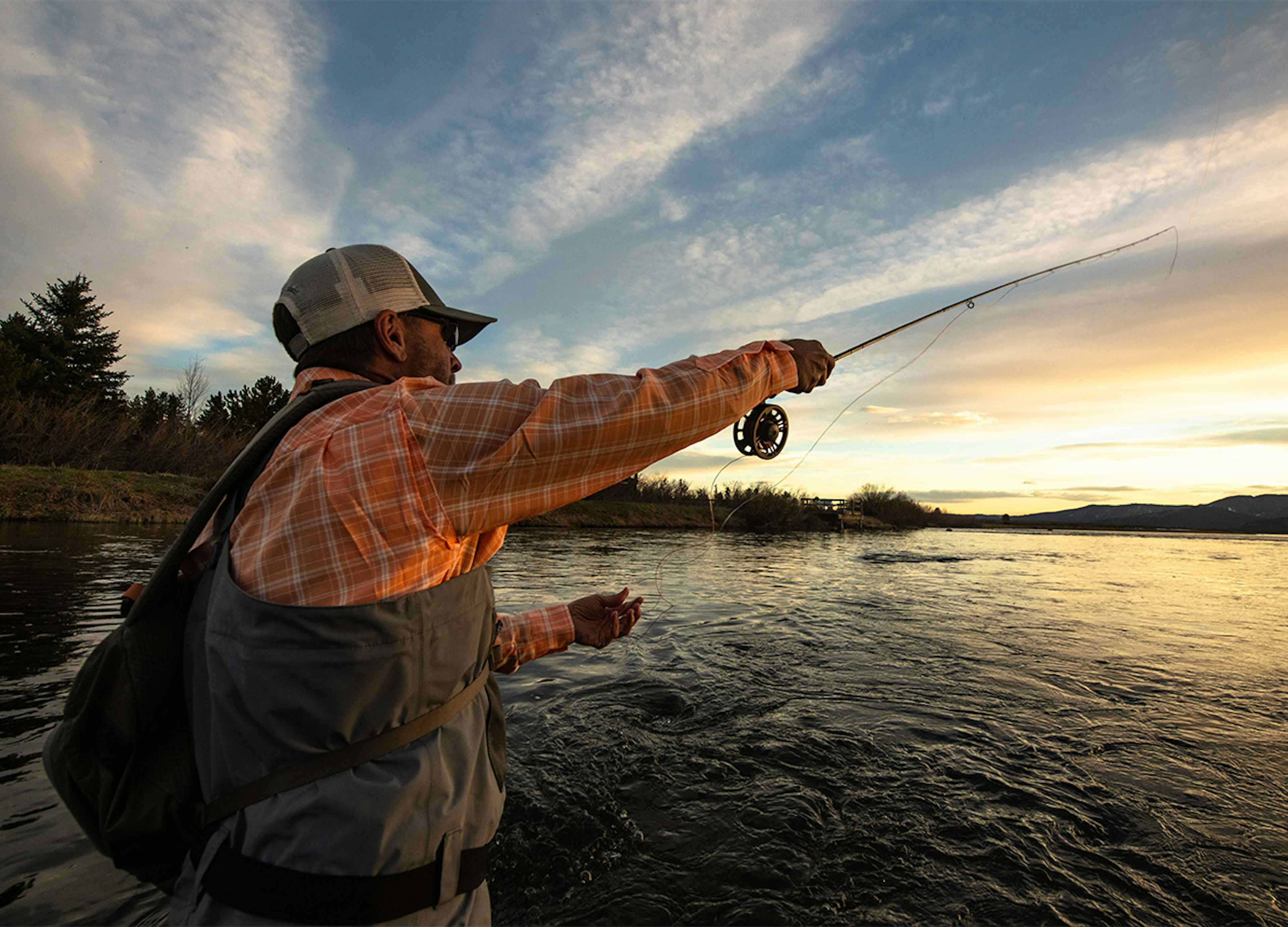 Fly fishing on the Henry's Fork of the Snake River in Island Park, ID, a part of Yellowstone Teton Territory.