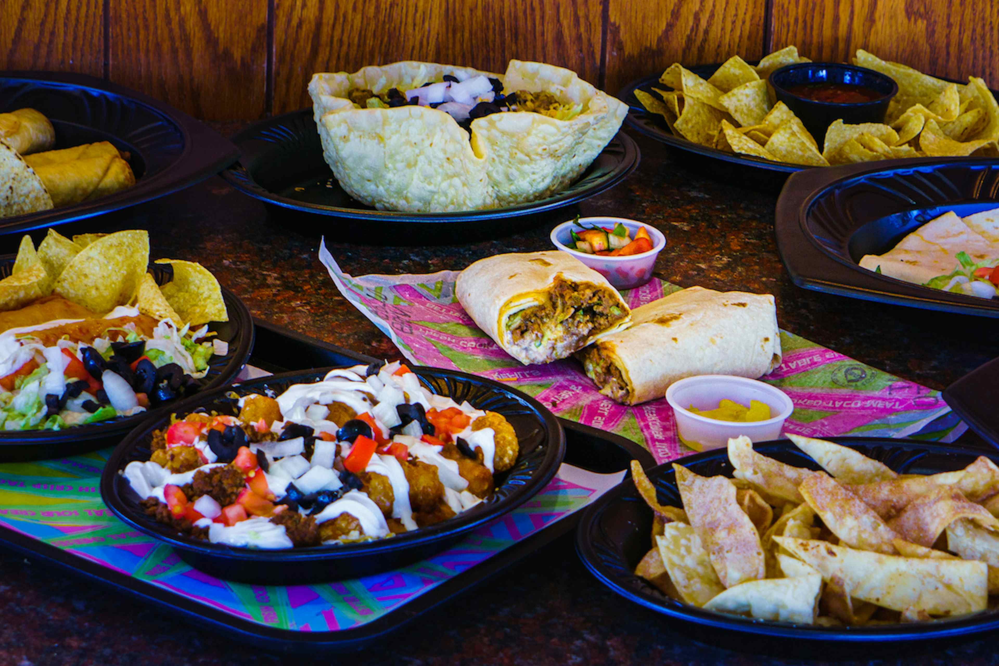 Plates filled with fresh burritos, chips and nachos, quesadillas, and more, all offered at Fiesta Ole of Eastern Idaho in the Yellowstone Teton Territory. 