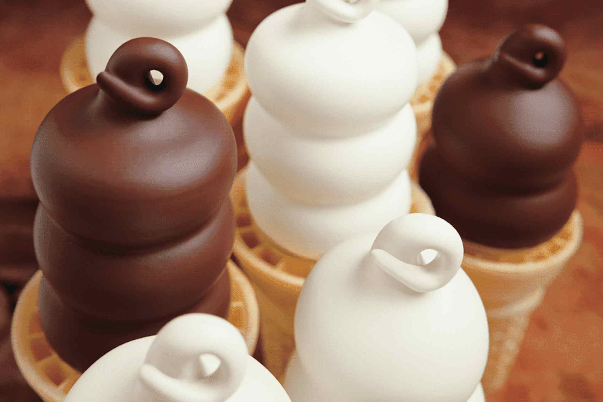 Ice cream cones covered in vanilla and chocolate coating, offered at Dairy Queen of Idaho Falls, Idaho.