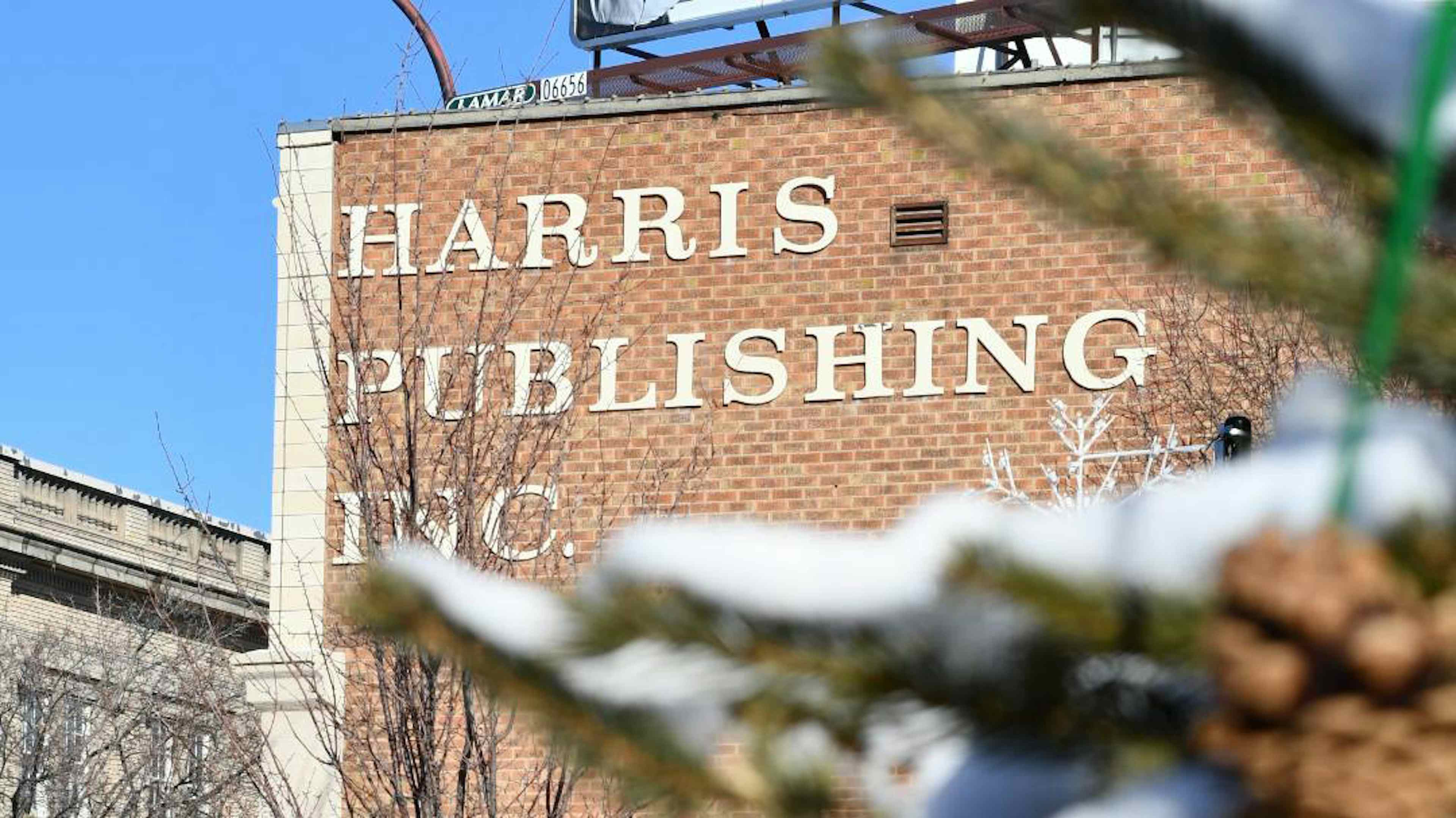 External view of Harris Publishing Inc. of Idaho Falls in the Yellowstone Teton Territory, dusted with a covering of snow.