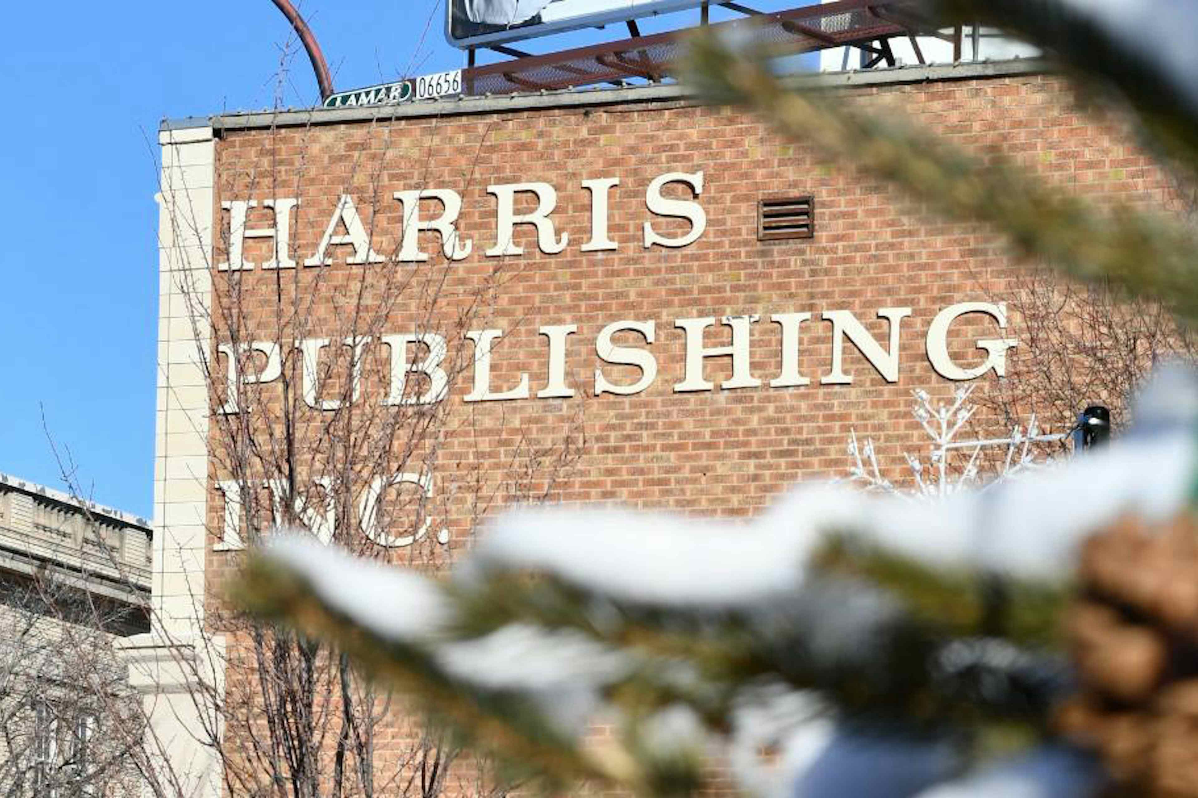 External view of Harris Publishing Inc. of Idaho Falls in the Yellowstone Teton Territory, dusted with a covering of snow.