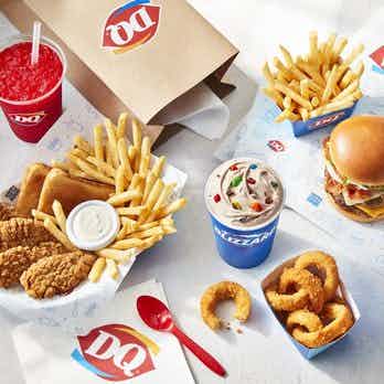 Items offered at Dairy Queen of Idaho Falls, including chicken tenders with fries, onion rings, burgers, and an m&m Blizzard.