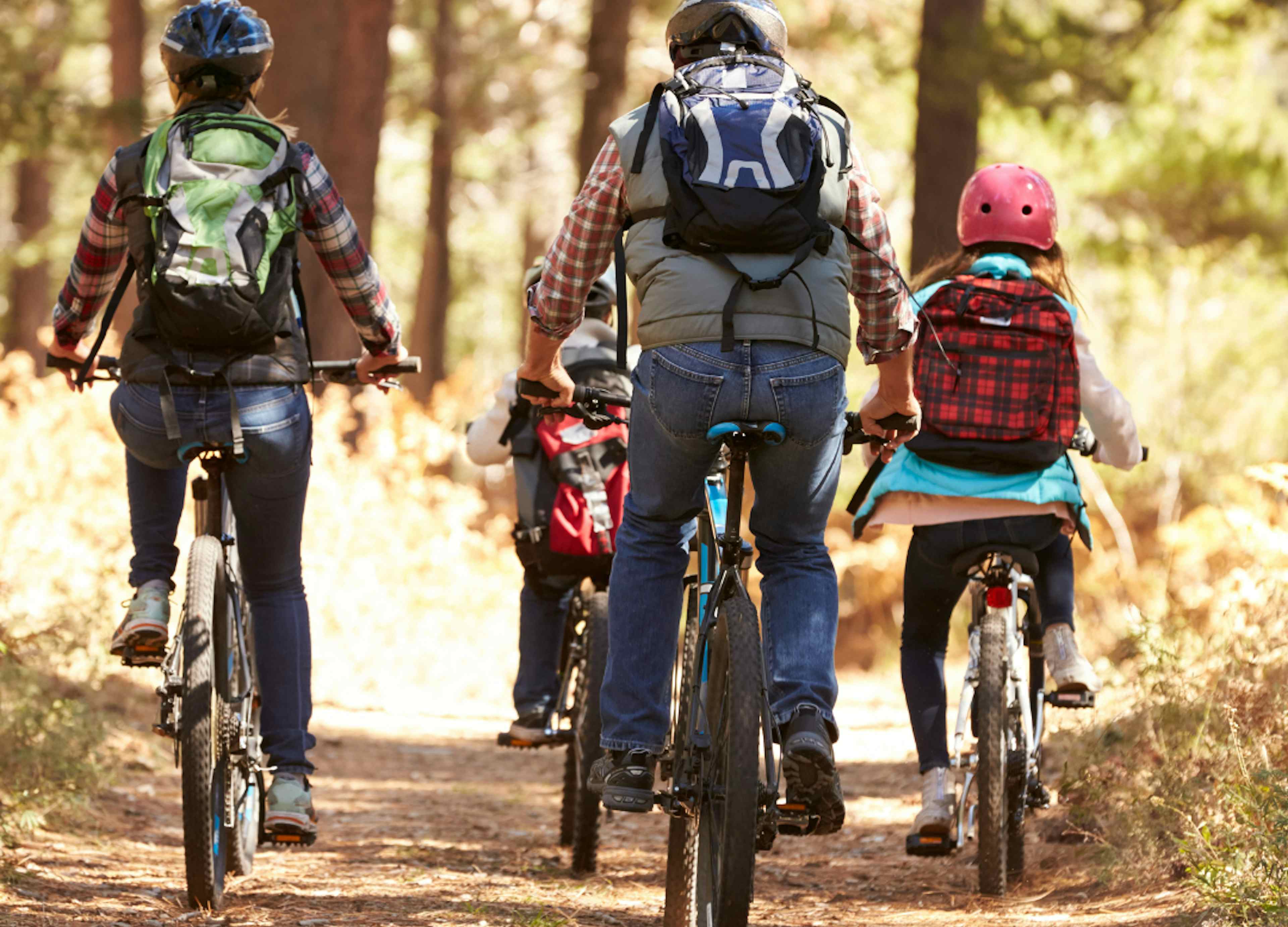 A family trail rides on bikes in Idaho Falls a part of Eastern Idaho and Yellowstone Teton Territory.