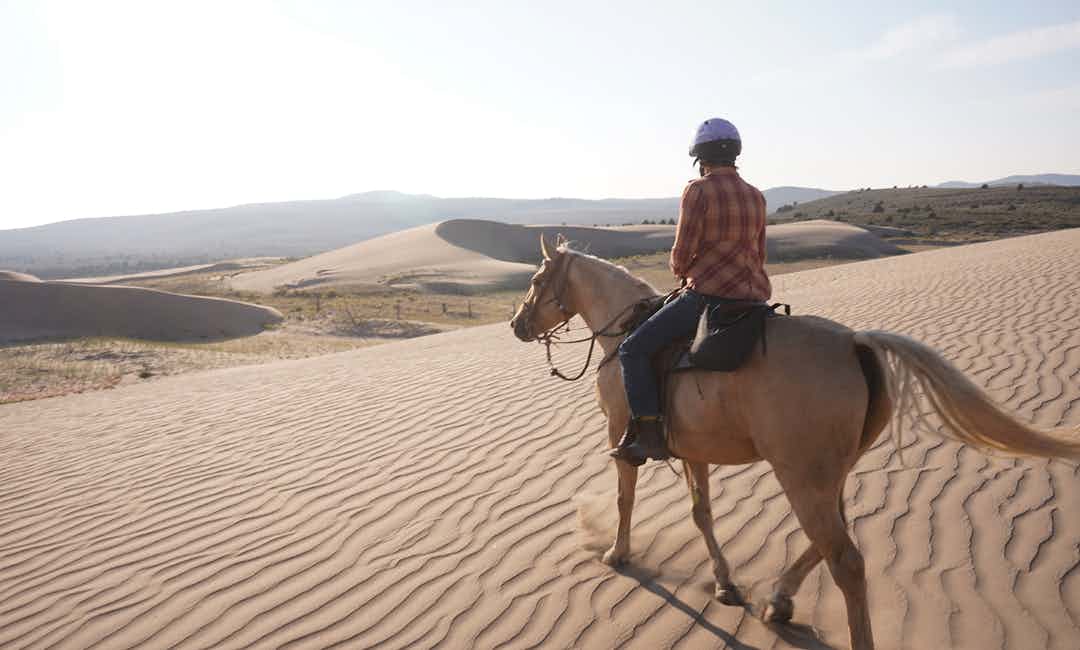 Horseback riding in St, Anthony, a small town in Eastern Idaho, a part of Yellowstone Teton Territory.