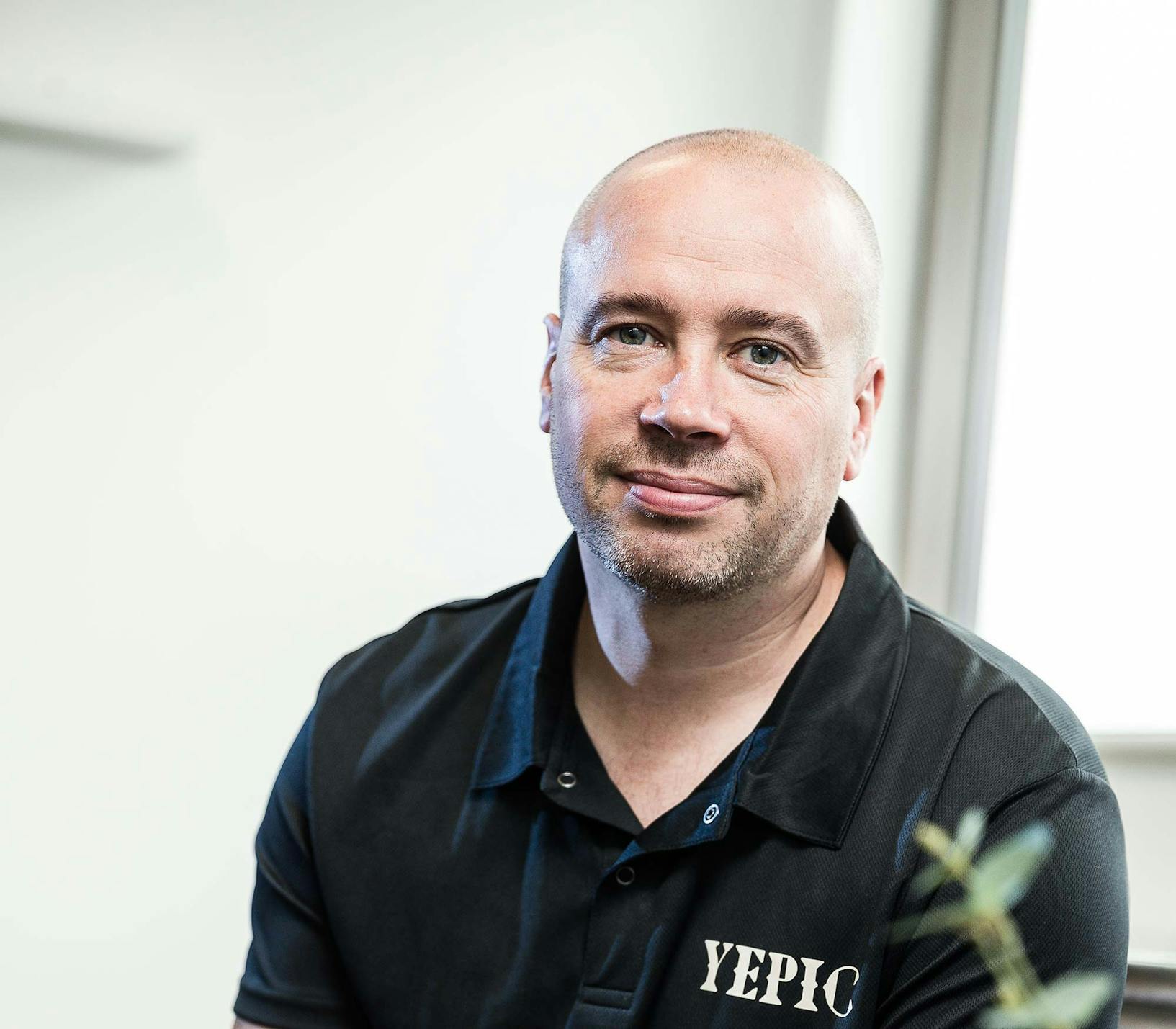 Portrait of Yepic CEO Sam Overment wearing Yepic T-Shirt.
