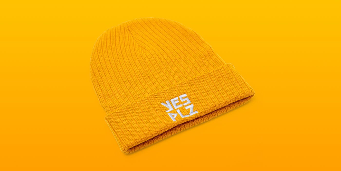 knit eco-beanie in yellow with the YES PLZ logo
