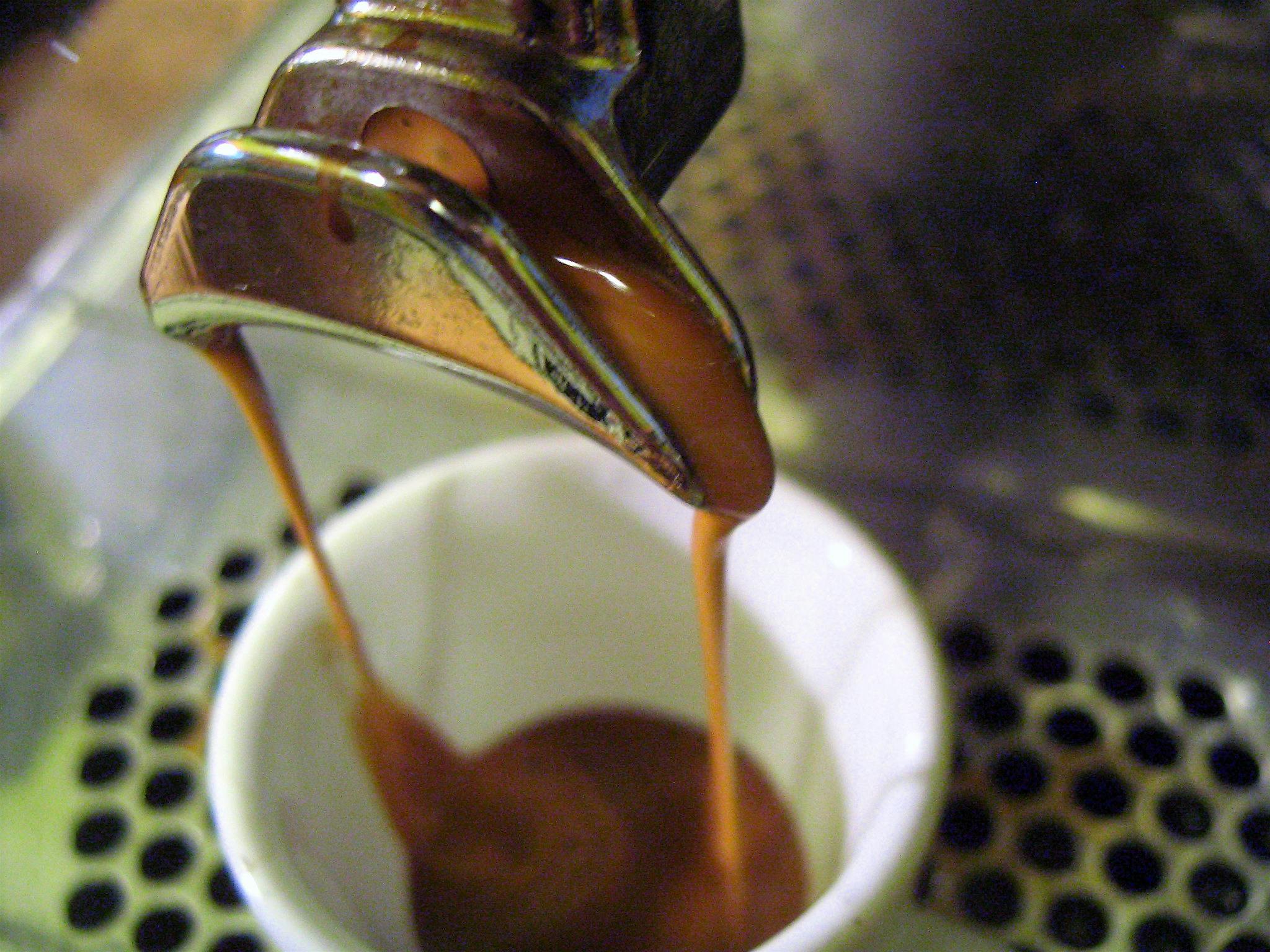 espresso dripping from a portafilter