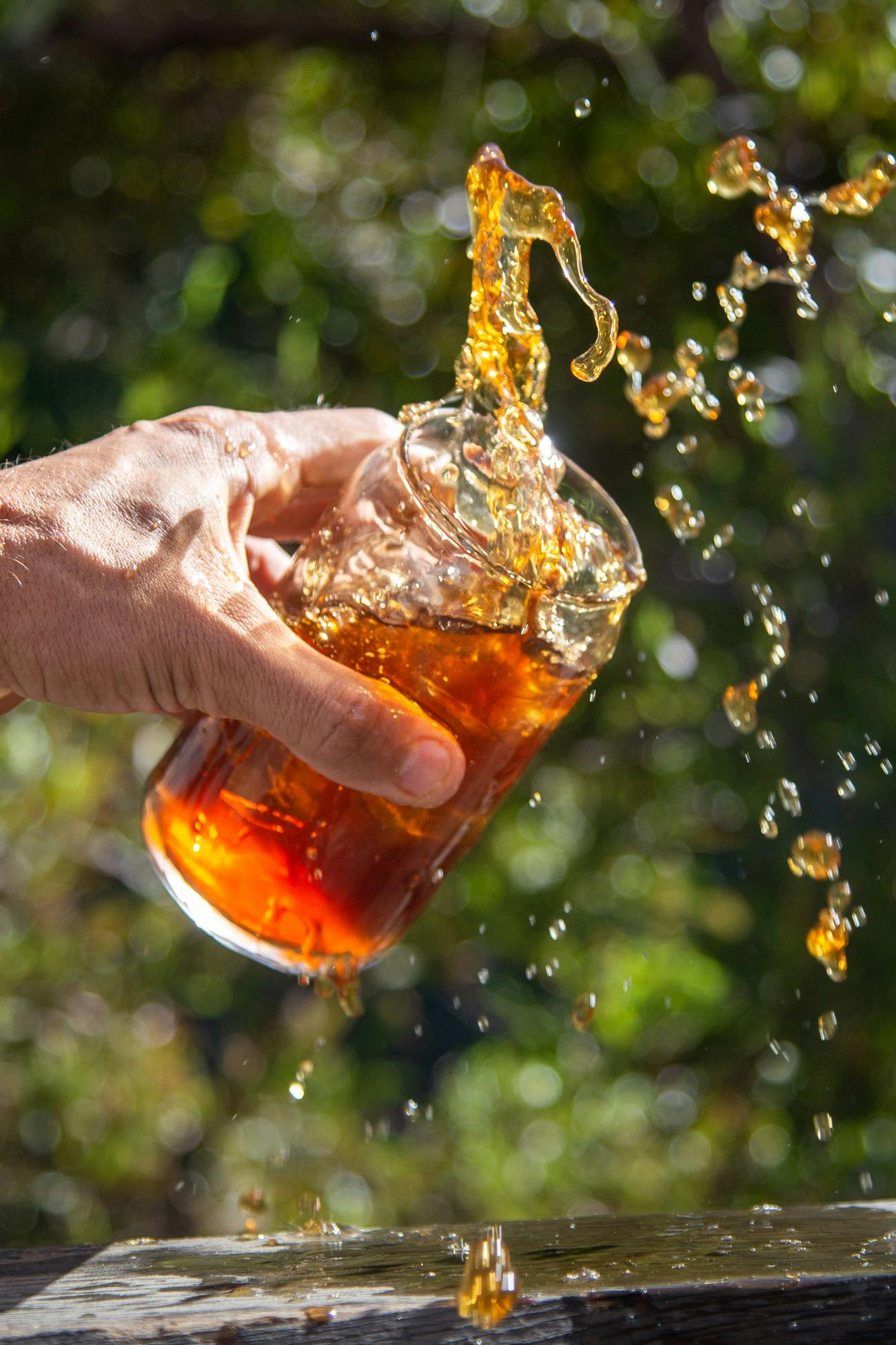 spilling some delicious cold brew coffee