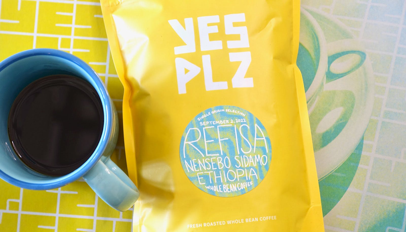 a bag of fresh roasted coffee labeled Refisa Ethiopia from YES PLZ Coffee