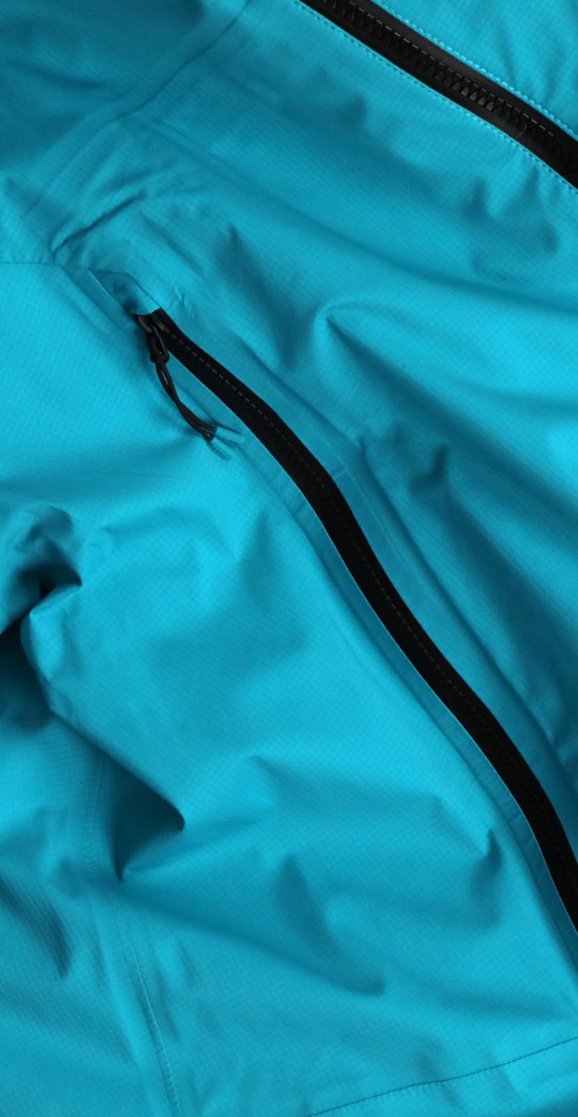 Turq Commit Jacket Detail