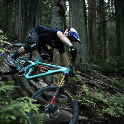 Richie Rude aboard to SB165 in a lush forest 