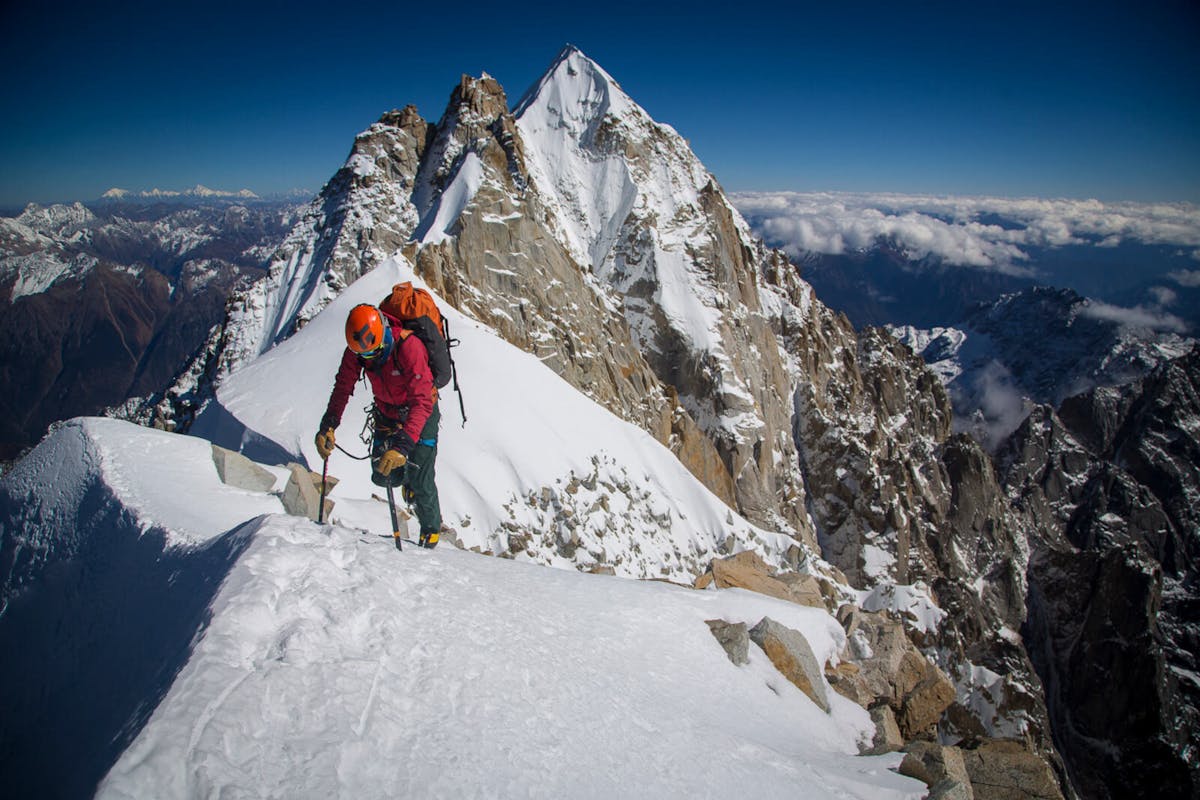 Renan Ozturk climbing on a ridge