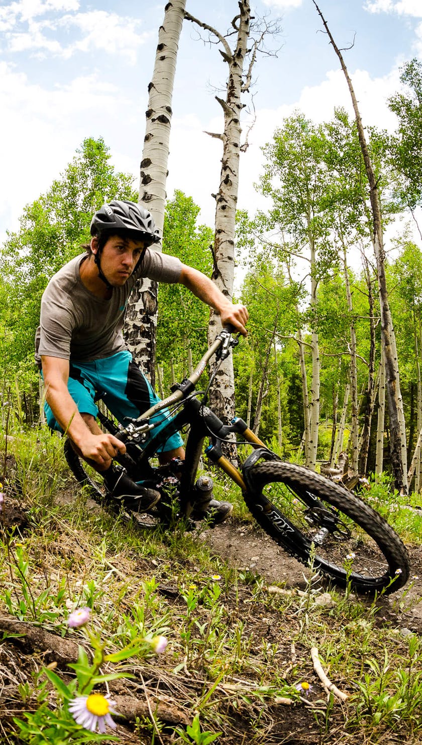 Joey Schusler dodging aspen trees