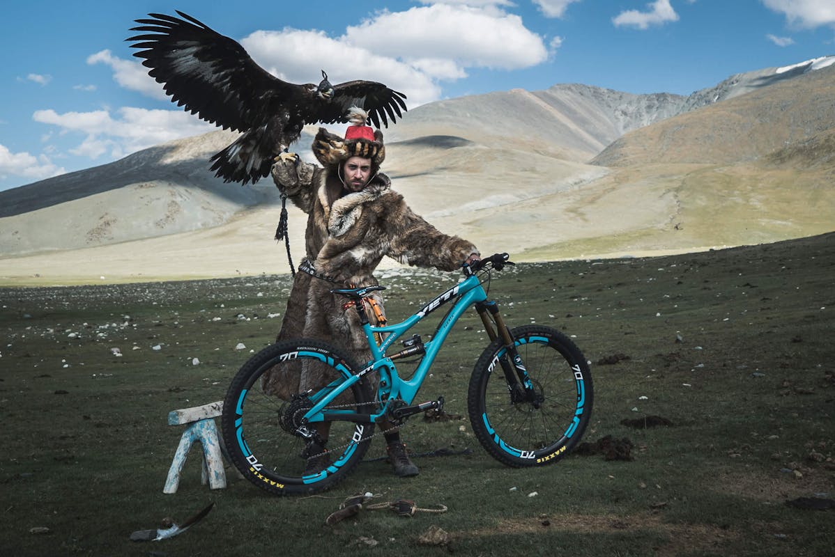 Joey Schusler wielding an eagle in one and and the SB5 in another.