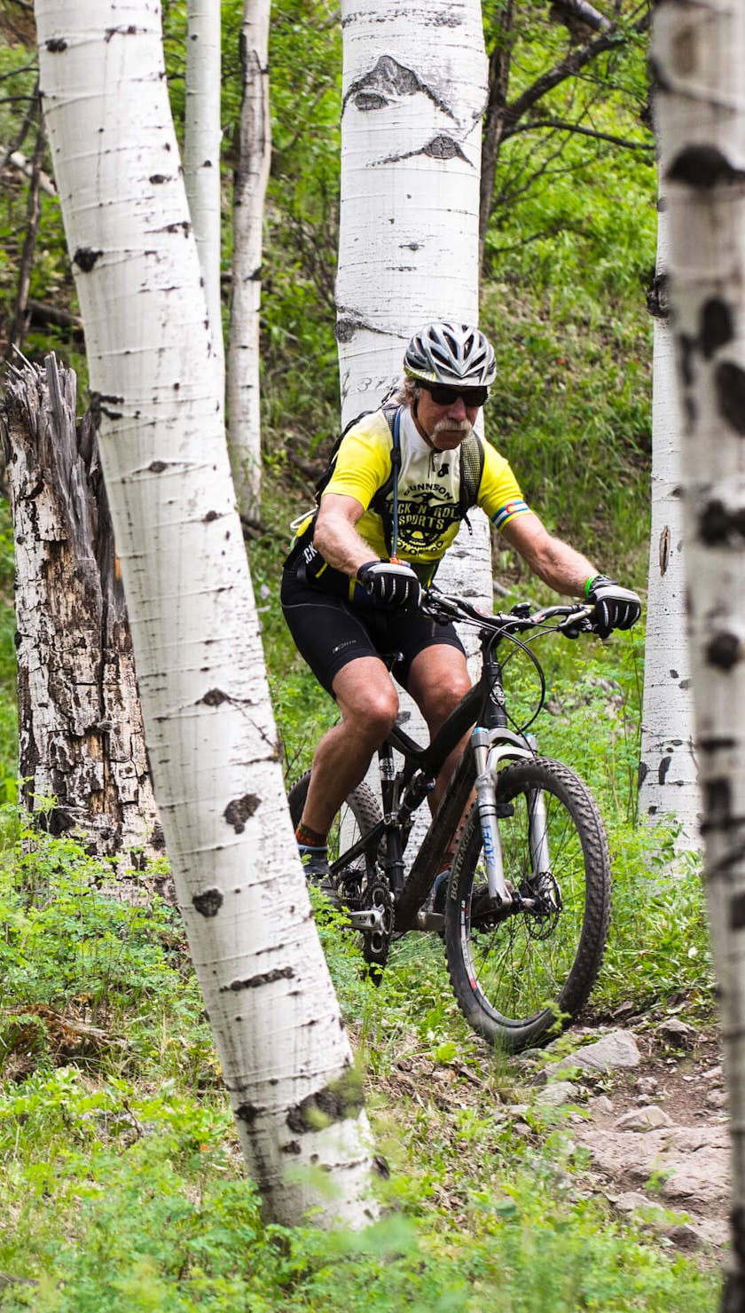 Riding through aspen trees