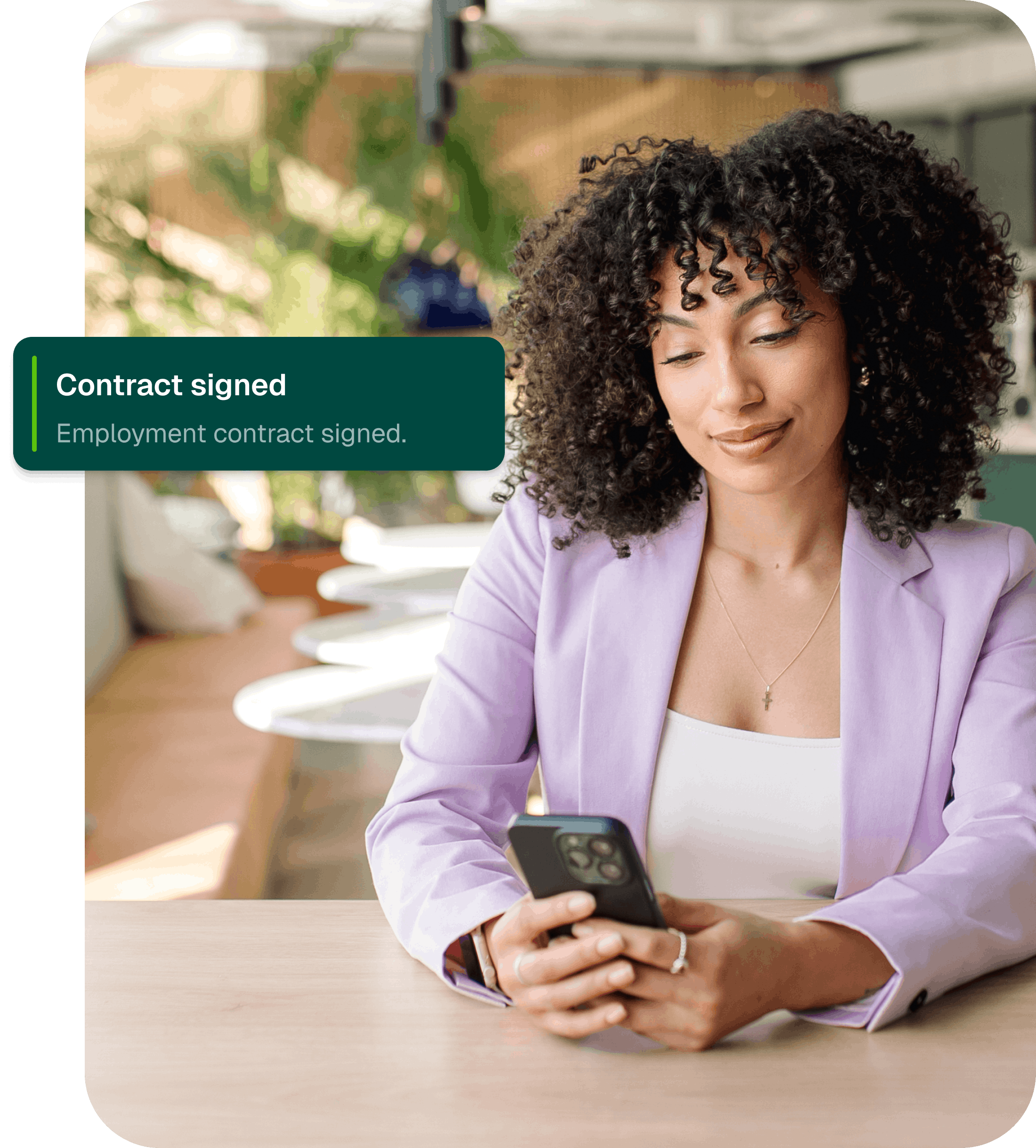 Employee signing her contract on her phone