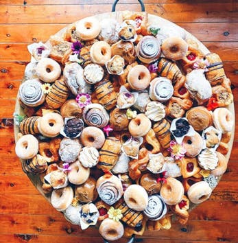 platter up co donuts and scrolls grazing board