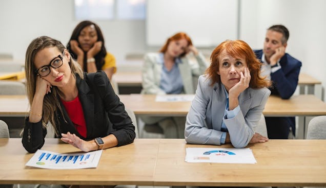 The picture shows a bored class room