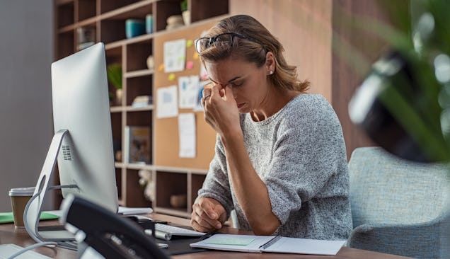 Stressed customer service agent working from home