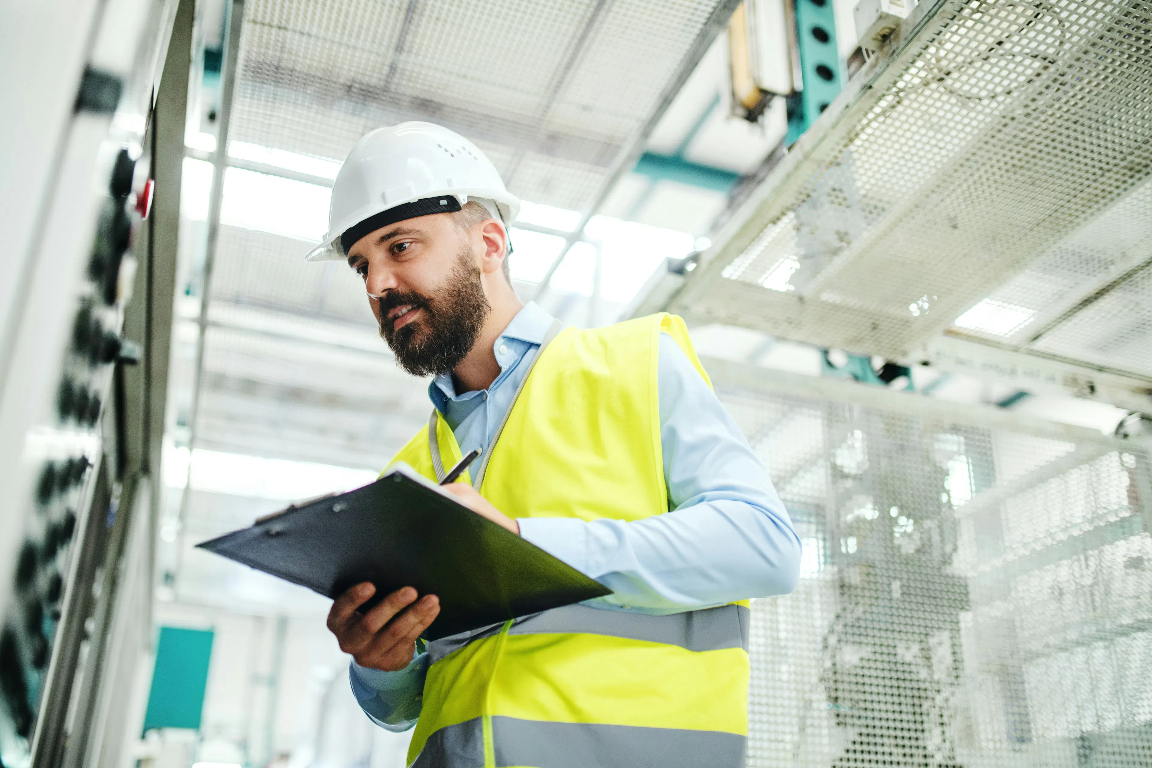 Shift supervisor in looking at a schedule 