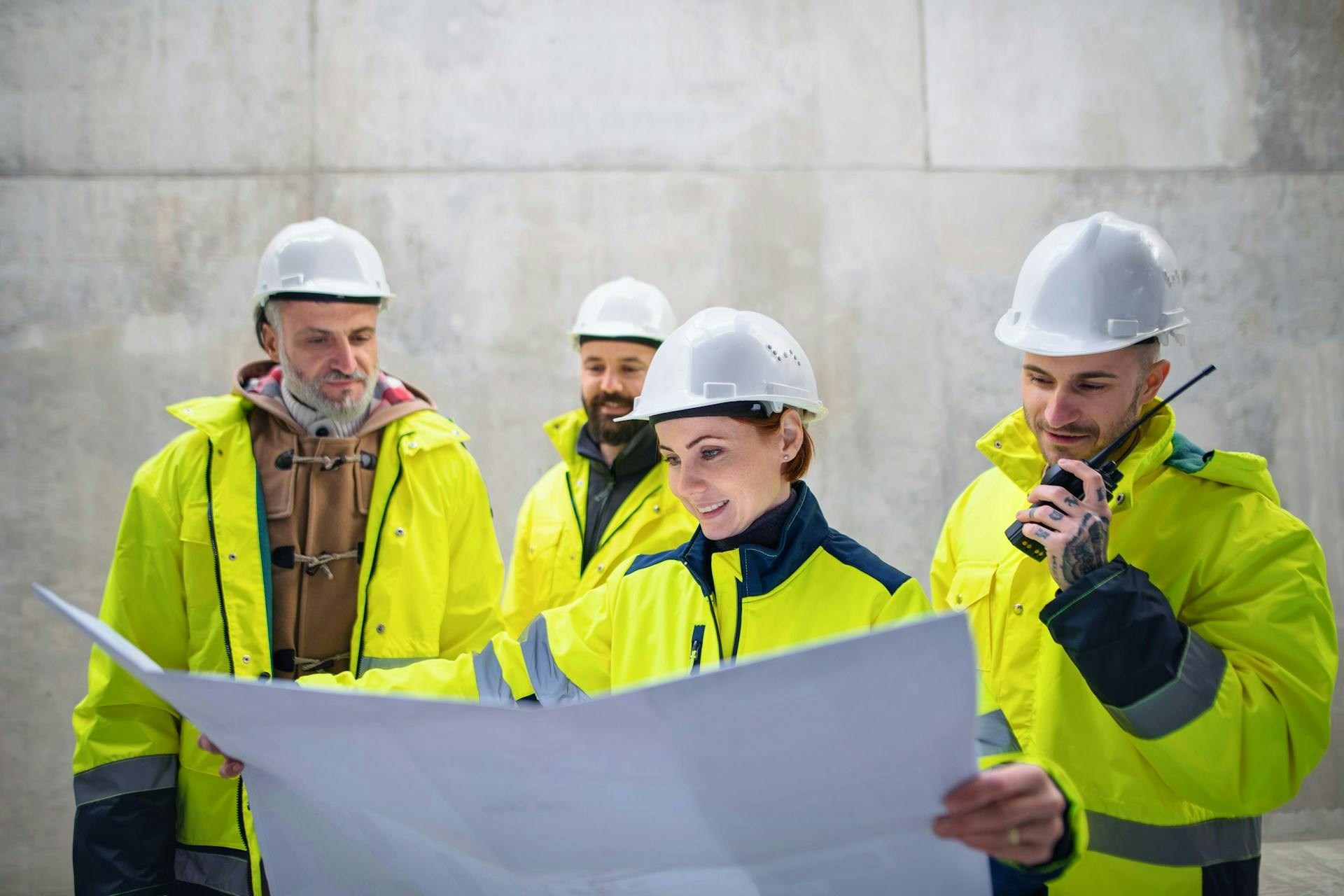 construction workers viewing a plan
