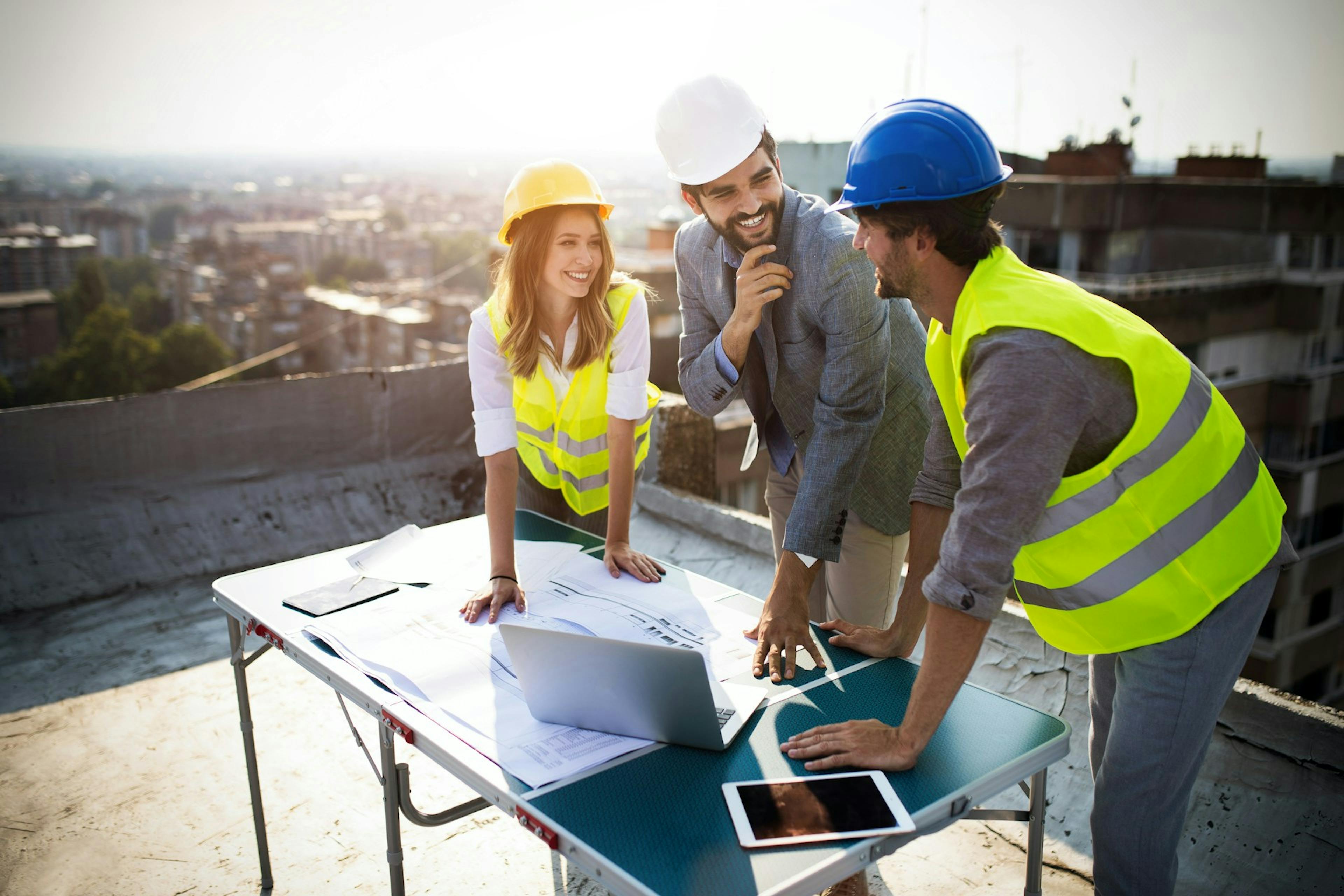 workers in hard hats discussing