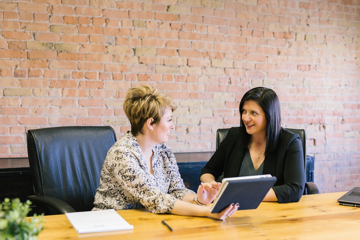 HR leaders discussing workforce strategy at a table