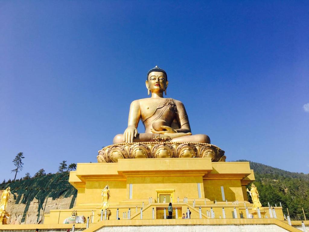 A giant gold Buddha sits in Bhutan.