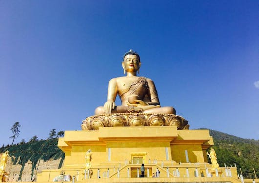 A giant gold Buddha sits in Bhutan.