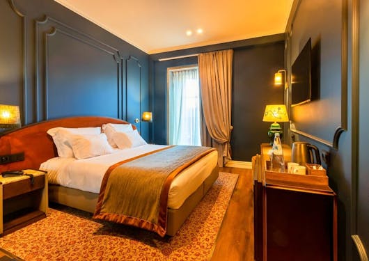 An example of the bedrooms in the luxury hotel accommodations on the Portuguese Coastal Walk luxury camino.