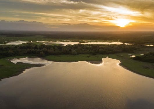 The sun sets over the Cano Negro wetlands in Costa Rica.