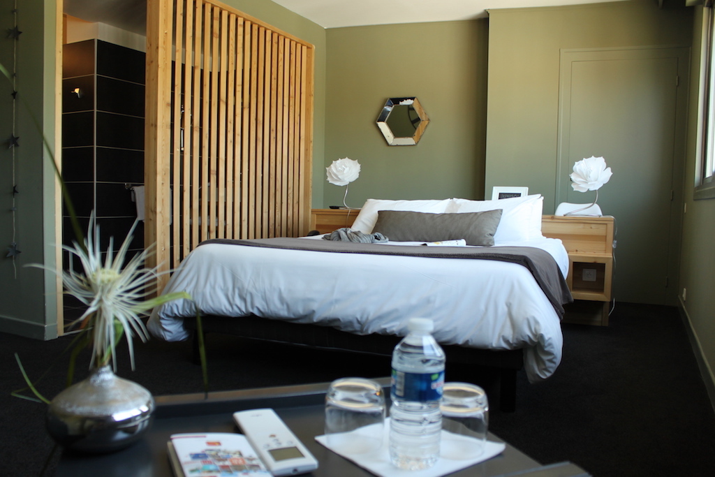 A bedroom at a French bed and breakfast hotel is shown with a double bed.