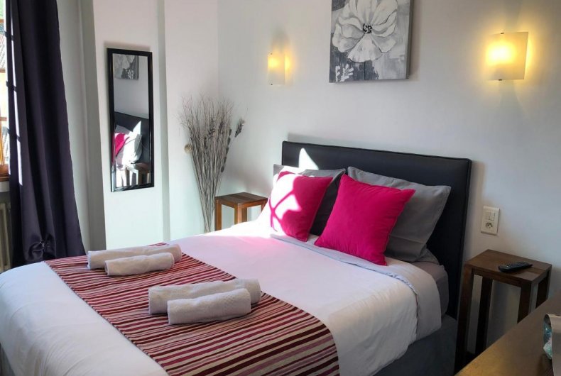 A bedroom at a French bed and breakfast hotel is shown with a double bed.