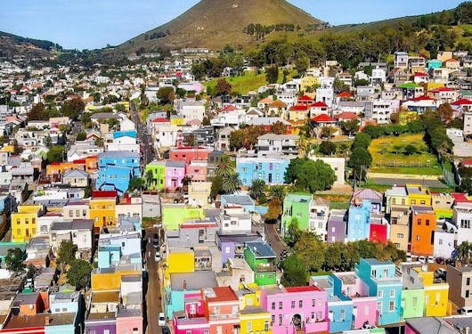 Colourful homes in the BoKaap, with Lion Head hill in the background