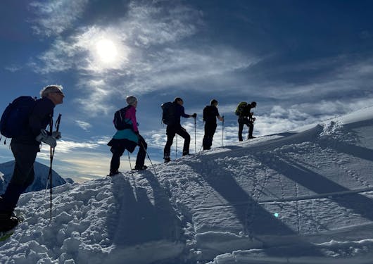 Snowshoeing to summit of Palastre in the Alps